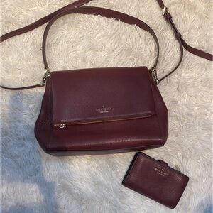 Burgundy Kate Spade crossbody/shoulder bag and matching wallet